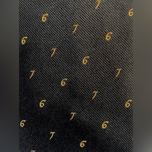 Dege Skinner of skid row navy tie with 6’s and 7’s